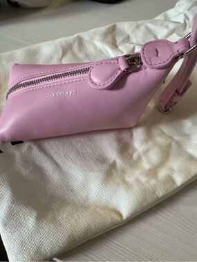 Purple Clutch with Silver Logo Accent.
